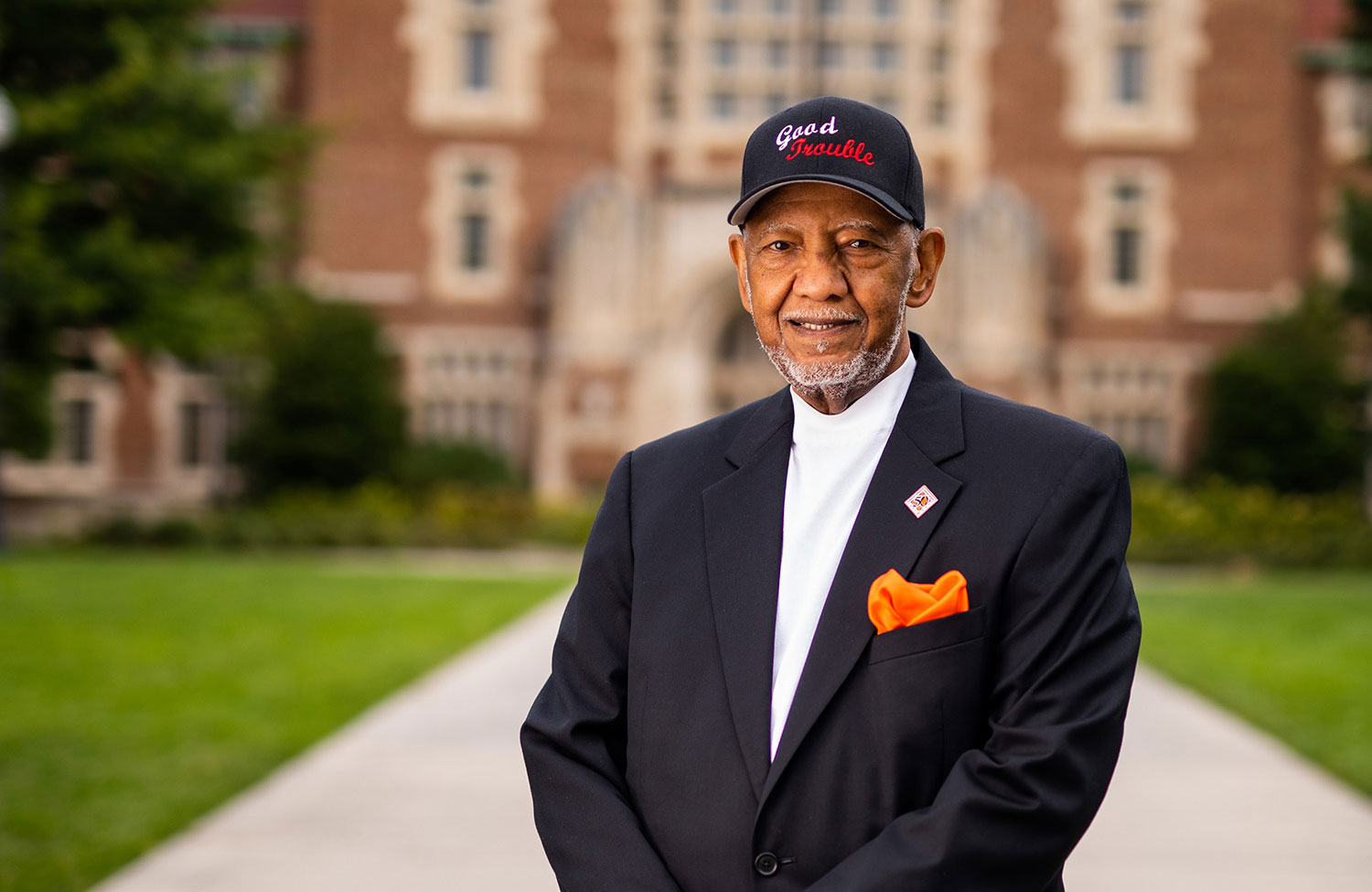 Theotis Robinson standing in front of Ayres Hall